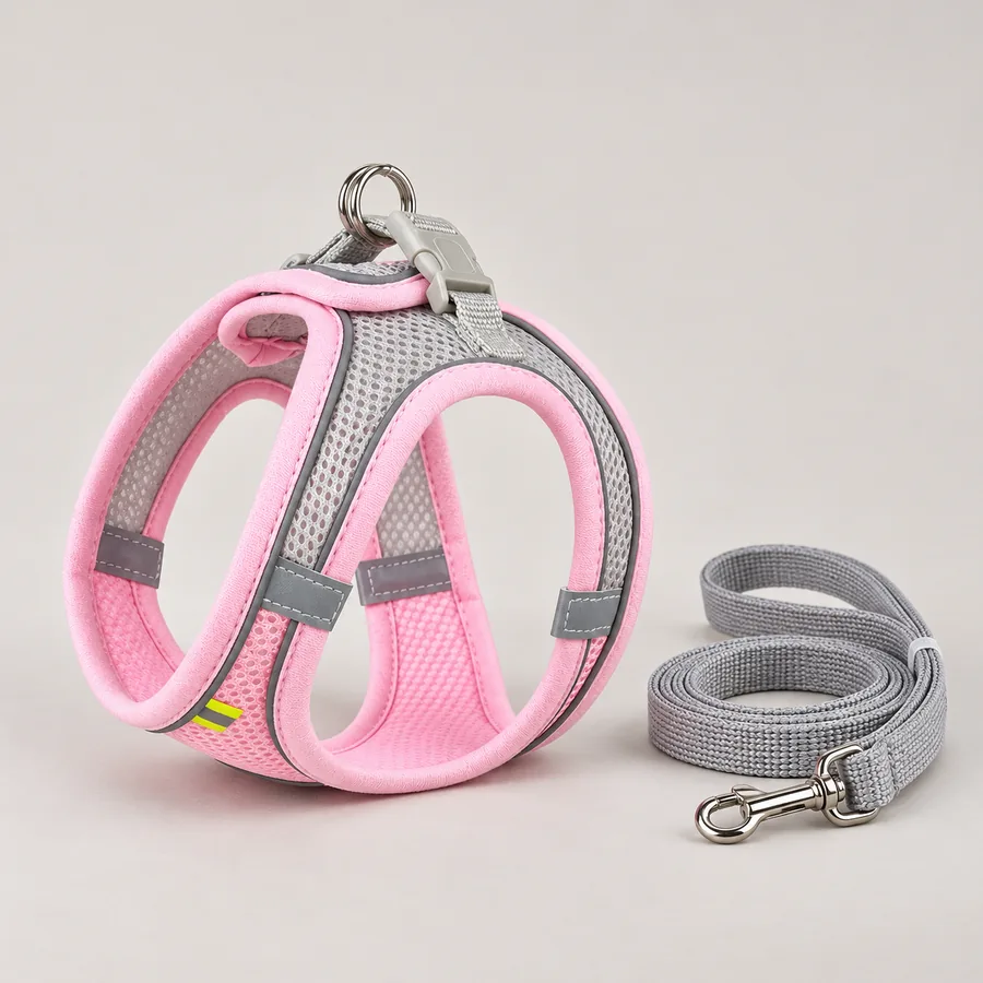 The pink Escapaw mesh vest and its matching grey leash photographed together on a plain studio background